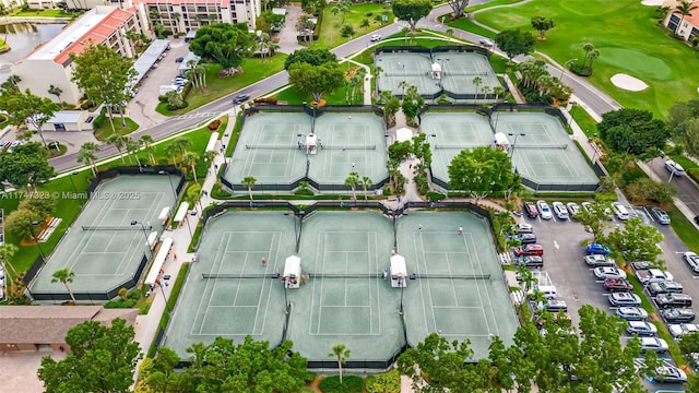 birds eye view of property with view of golf course