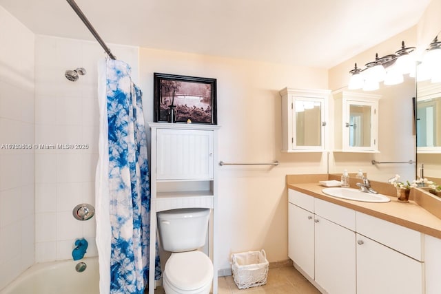 bathroom featuring vanity, tile patterned floors, shower / tub combo, and toilet