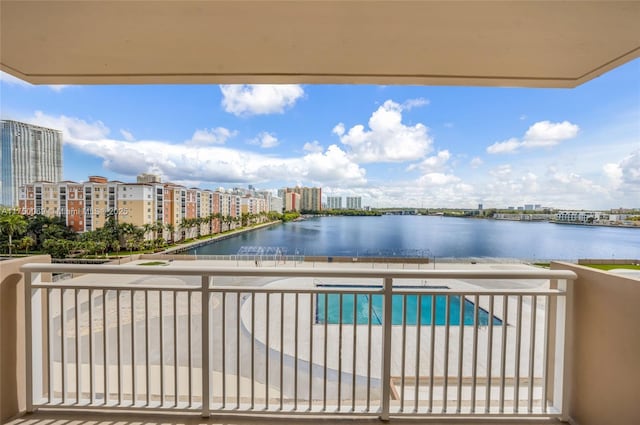 pool featuring a water view and a city view