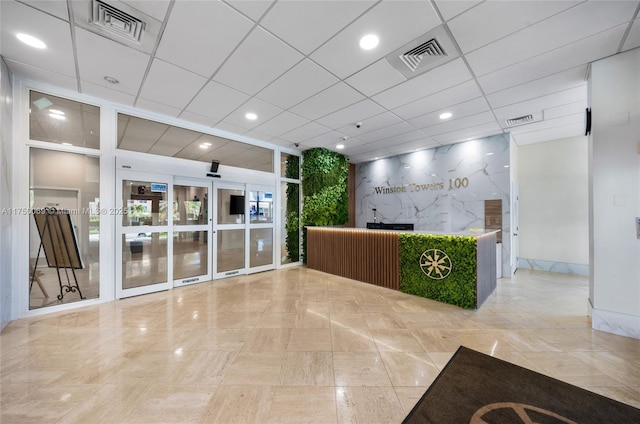 welcome area featuring visible vents and french doors