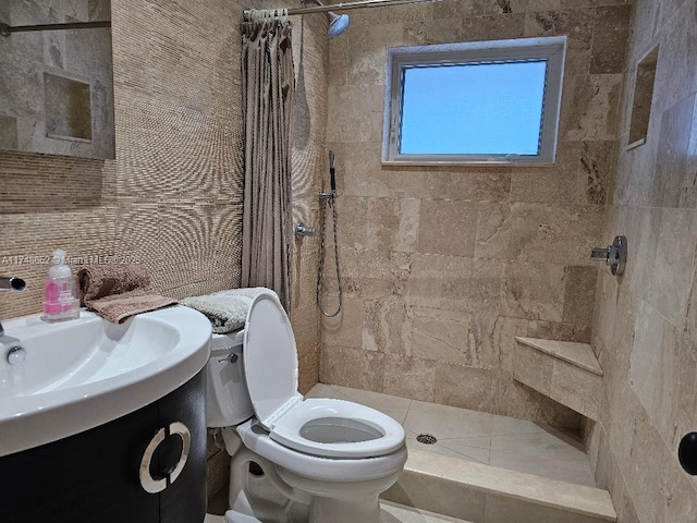 full bathroom with toilet, tasteful backsplash, a tile shower, and vanity