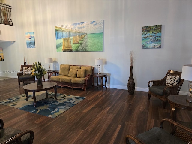 1505 N Riverside Dr Unit 604, Pompano Beach, FL 33062 - living room featuring dark wood-style floors and baseboards