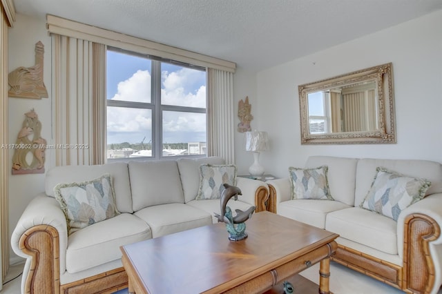 1505 N Riverside Dr Unit 604, Pompano Beach, FL 33062 - living room with a textured ceiling