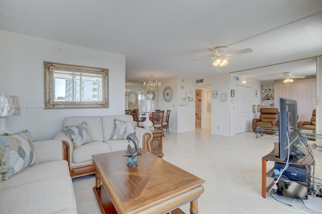 1505 N Riverside Dr Unit 604, Pompano Beach, FL 33062 - living area with a ceiling fan and a chandelier
