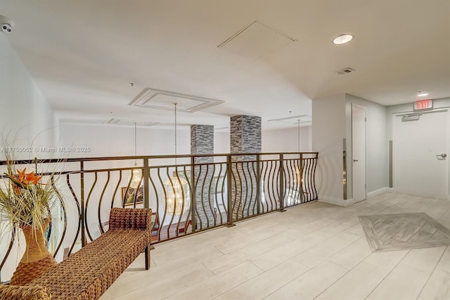 1505 N Riverside Dr Unit 604, Pompano Beach, FL 33062 - corridor with attic access and recessed lighting