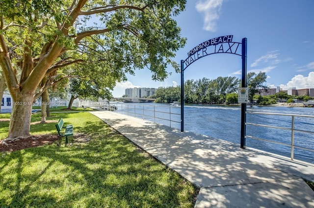 1505 N Riverside Dr Unit 604, Pompano Beach, FL 33062 - surrounding community featuring a yard and a water view