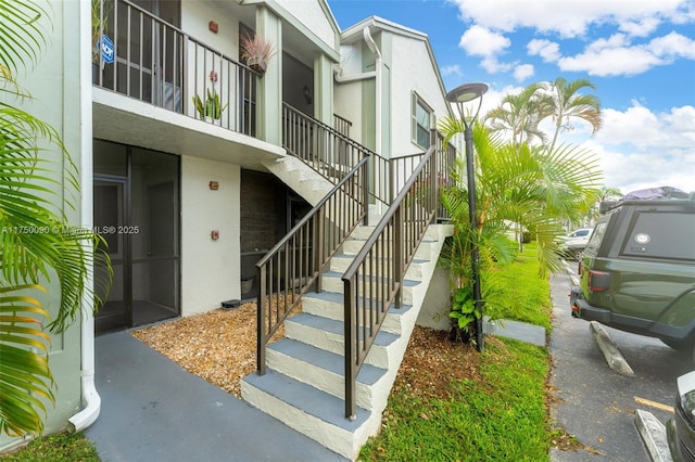 view of property with stairway