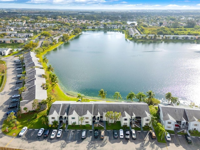 aerial view with a water view and a residential view