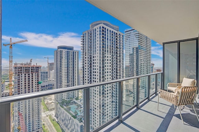 balcony featuring a city view