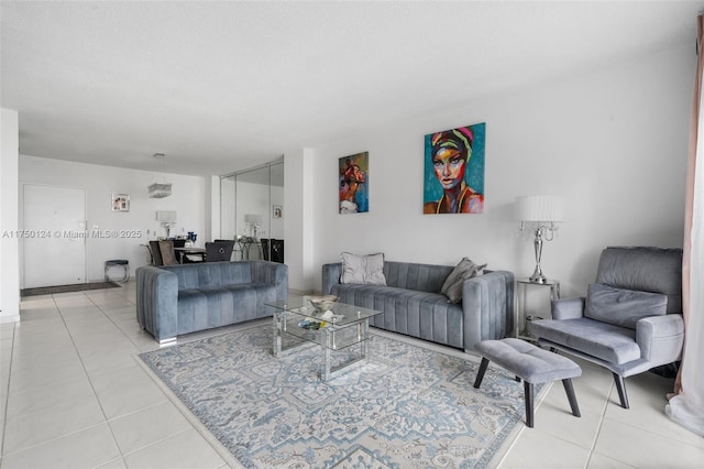 300 Bayview Dr Unit 807, Sunny Isles Beach, FL 33160 - living room featuring light tile patterned flooring