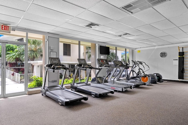 300 Bayview Dr Unit 807, Sunny Isles Beach, FL 33160 - exercise room with plenty of natural light, carpet flooring, and a drop ceiling