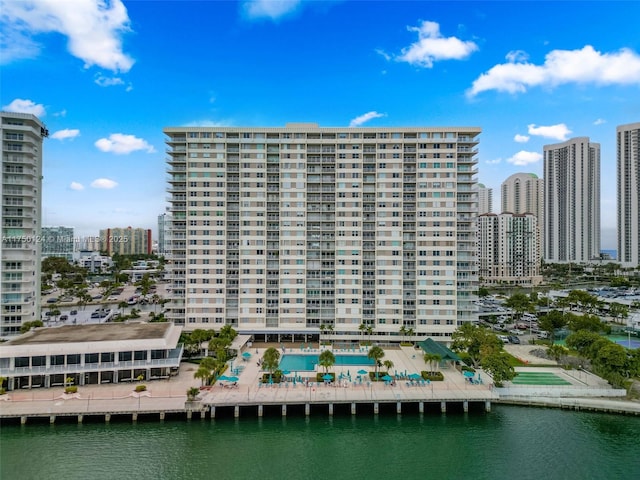 300 Bayview Dr Unit 807, Sunny Isles Beach, FL 33160 - view of building exterior with a skyline view and a water view