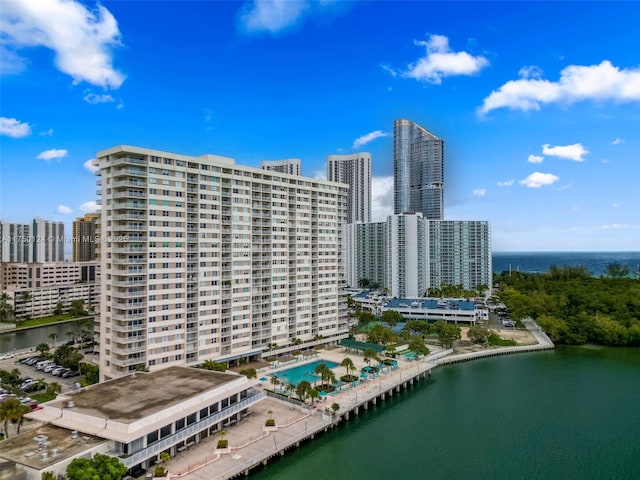 bird's eye view featuring a view of city and a water view