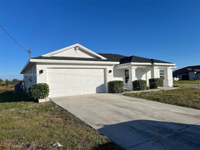 ranch-style house with stucco siding, a shingled roof, concrete driveway, a front yard, and a garage