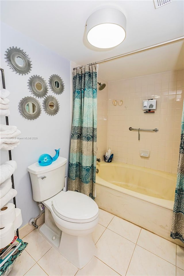 bathroom with tile patterned flooring, visible vents, toilet, and shower / bath combo