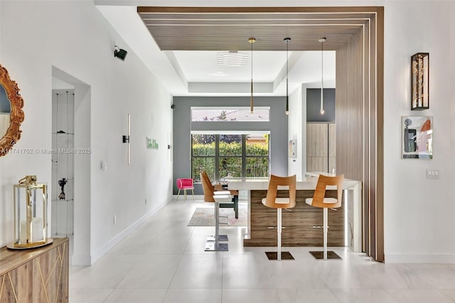 14955 SW 33rd St, Davie, FL 33331 - dining room featuring a tray ceiling and light tile patterned floors