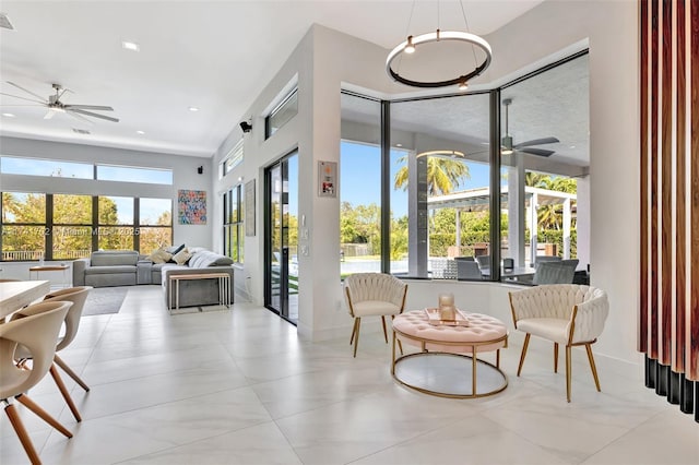 14955 SW 33rd St, Davie, FL 33331 - sitting room with a ceiling fan, recessed lighting, and a towering ceiling