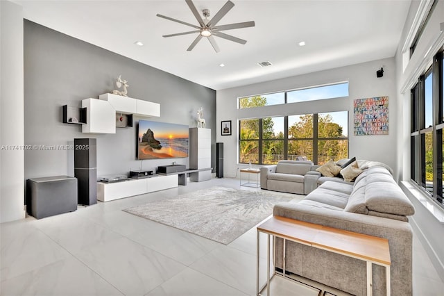 14955 SW 33rd St, Davie, FL 33331 - living area with ceiling fan, healthy amount of natural light, a towering ceiling, and recessed lighting
