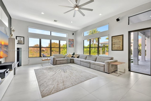 14955 SW 33rd St, Davie, FL 33331 - living room featuring ceiling fan, a high ceiling, recessed lighting, and light tile patterned floors