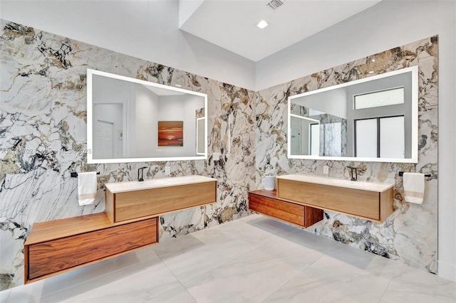 14955 SW 33rd St, Davie, FL 33331 - bathroom featuring tile walls, two vanities, a shower, and backsplash