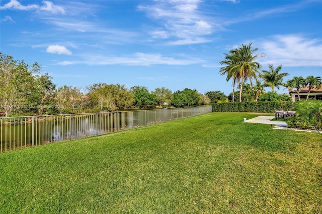 14955 SW 33rd St, Davie, FL 33331 - fenced backyard featuring a water view and a patio