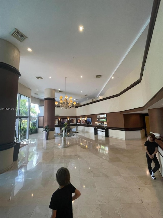 building lobby featuring visible vents