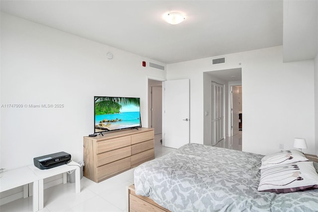 7825 NW 107th Ave Unit 604, Doral, FL 33178 - bedroom featuring light tile patterned flooring