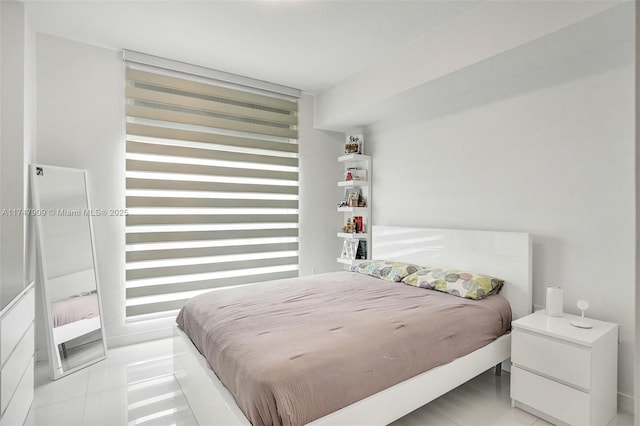 7825 NW 107th Ave Unit 604, Doral, FL 33178 - bedroom featuring light tile patterned floors