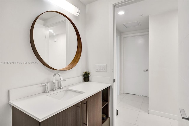 7825 NW 107th Ave Unit 604, Doral, FL 33178 - bathroom featuring vanity, tile patterned flooring, and baseboards