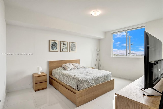 bedroom featuring tile patterned flooring