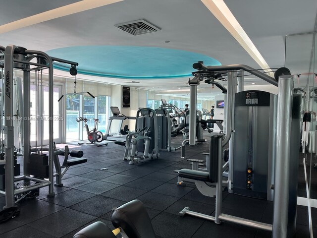 exercise room featuring visible vents