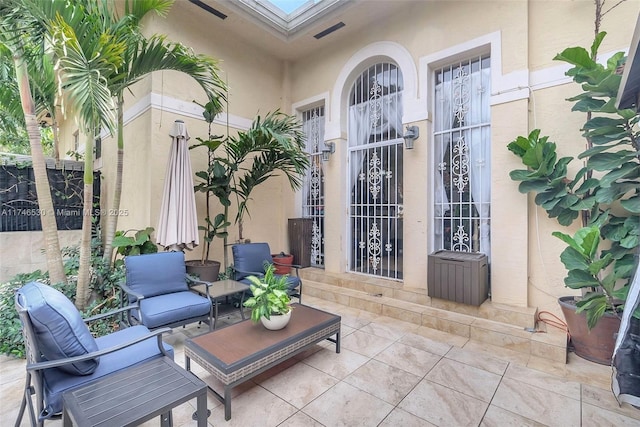 view of patio / terrace featuring visible vents