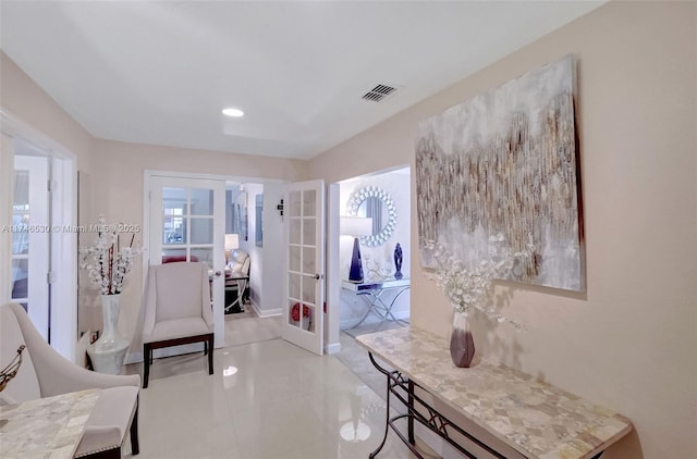 interior space with french doors, light tile patterned flooring, visible vents, and recessed lighting