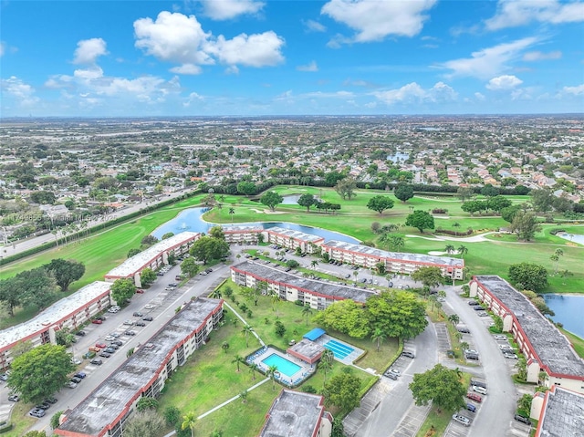 birds eye view of property featuring a water view and golf course view