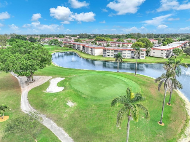 bird's eye view featuring a water view and golf course view