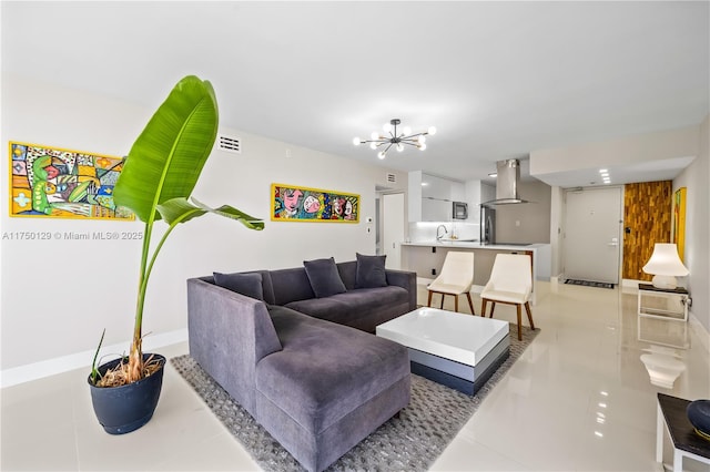 living area featuring a chandelier, visible vents, and light tile patterned floors