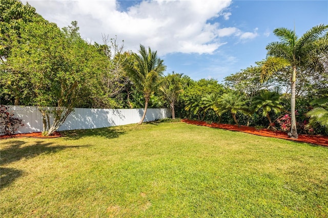 view of yard with fence