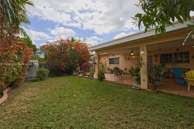 view of yard featuring a patio area and fence