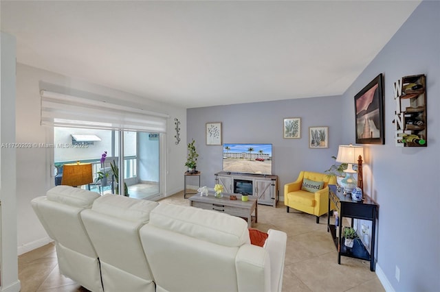 5300 Washington St Unit I203, Hollywood, FL 33021 - living area with light tile patterned floors and baseboards