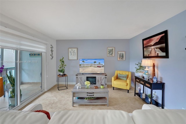 5300 Washington St Unit I203, Hollywood, FL 33021 - living area with baseboards and tile patterned flooring