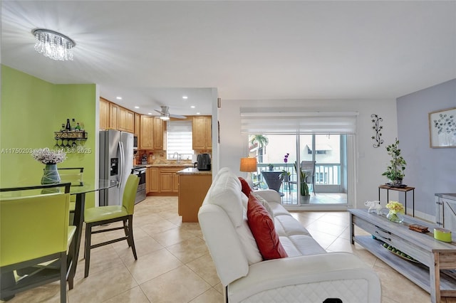 5300 Washington St Unit I203, Hollywood, FL 33021 - living area with recessed lighting, light tile patterned flooring, and ceiling fan with notable chandelier
