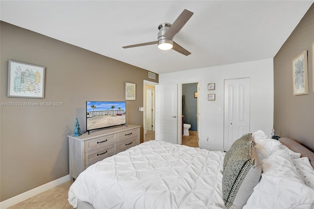 5300 Washington St Unit I203, Hollywood, FL 33021 - bedroom featuring light tile patterned floors, connected bathroom, ceiling fan, visible vents, and baseboards