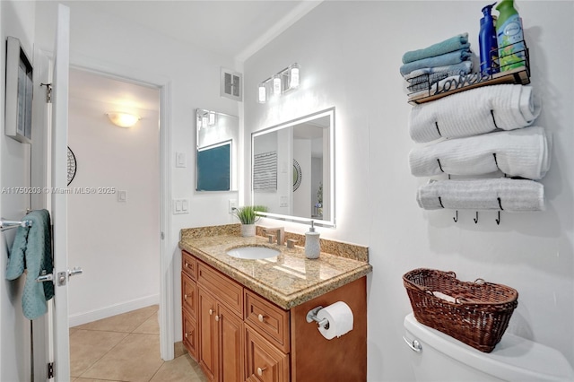 5300 Washington St Unit I203, Hollywood, FL 33021 - half bathroom with toilet, vanity, visible vents, and tile patterned floors