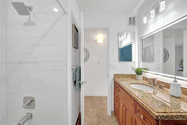 5300 Washington St Unit I203, Hollywood, FL 33021 - full bathroom featuring tile patterned floors, shower / washtub combination, vanity, baseboards, and visible vents