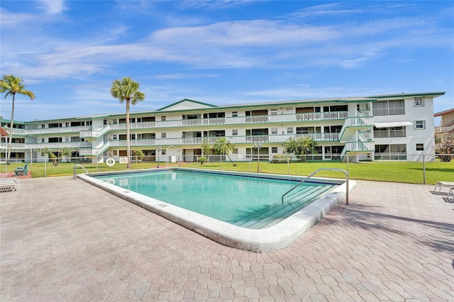 5300 Washington St Unit I203, Hollywood, FL 33021 - pool featuring a lawn and fence