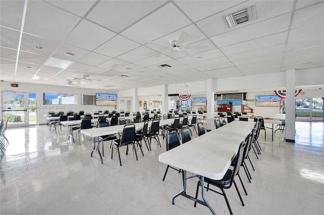 5300 Washington St Unit I203, Hollywood, FL 33021 - dining room featuring a paneled ceiling, visible vents, a wealth of natural light, and a ceiling fan