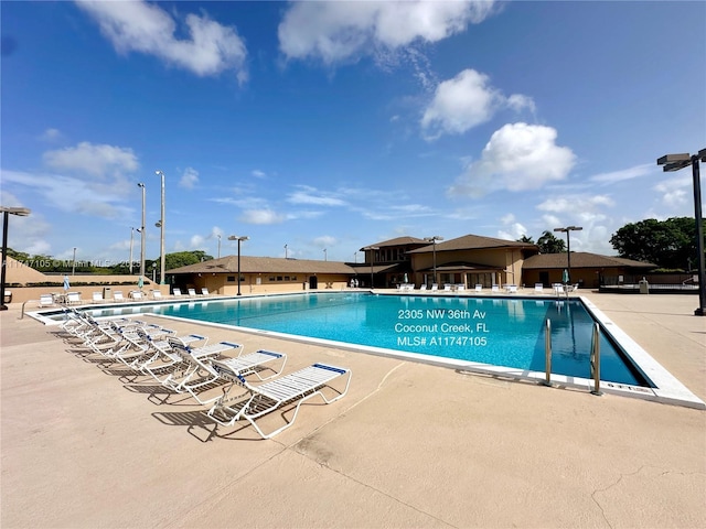 pool featuring a patio area