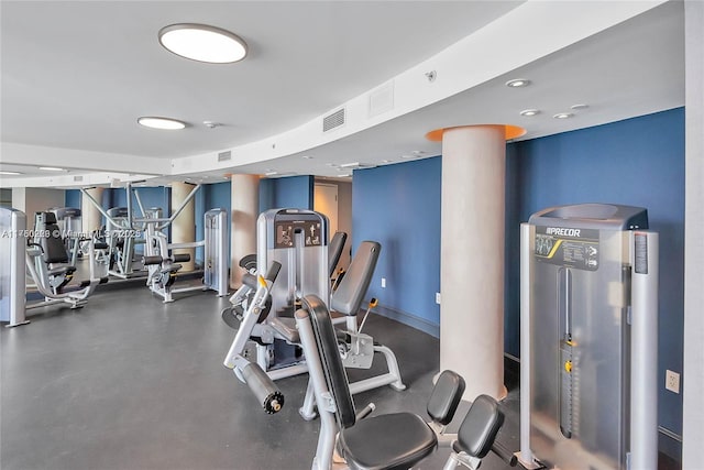 workout area with visible vents and baseboards