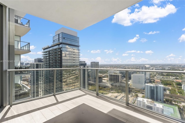 balcony featuring a view of city