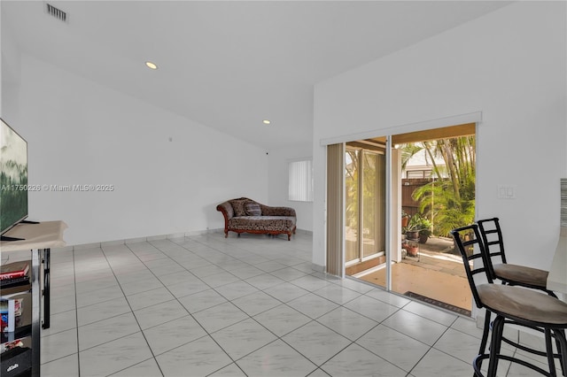 sitting room featuring recessed lighting, visible vents, vaulted ceiling, and light tile patterned flooring